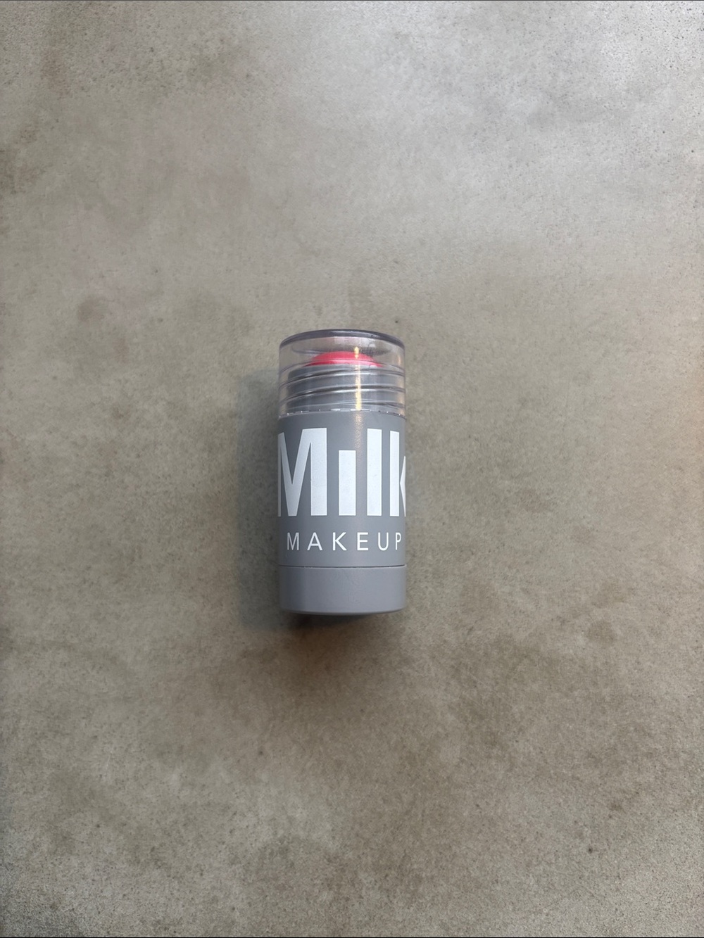 Milk Makeup Lip and Cheek Cream Stick Mini— Flip — Bright vibrant true red.